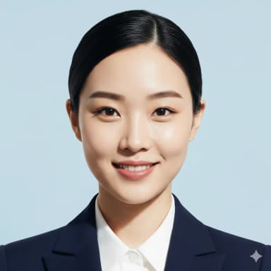 Studio-quality close-up portrait of a female cabin crew candidate, from the collarbone to the top of her head. She presents a genuine, natural open-mouth smile. Her hair is perfectly groomed in a professional bun, showcasing a tidy appearance. Professional, visible makeup. She wears a professional fitted jacket and a white shirt/blouse. The photo has a plain light blue background, is sharp, in focus, and naturally lit without glare.